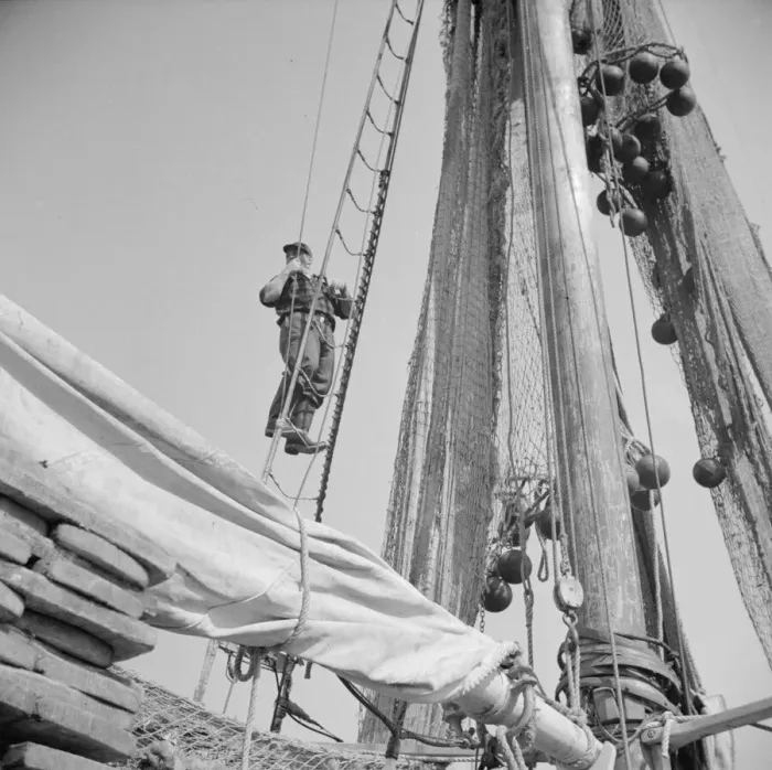 Framed Print : Gloucester fisherman standing in the rigging of a New England fishing boat, New York, 1943. Creator: Gordon Parks Framed Print : Gloucester fisherman standing in the rigging of a New England fishing boat, New York, 1943. Creator: Gordon Parks