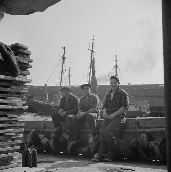 Gloucester fishermen resting on their boat at the Fulton fish market, New York, 1943. Creator: Gordon Parks
