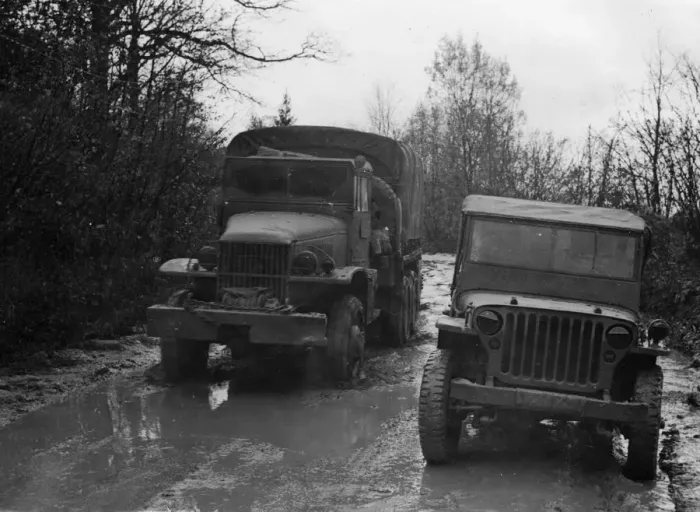 Framed Print : GMC 352 CCKW and Willys Jeep circa 1944. Creator: Unknown Framed Print : GMC 352 CCKW and Willys Jeep circa 1944. Creator: Unknown