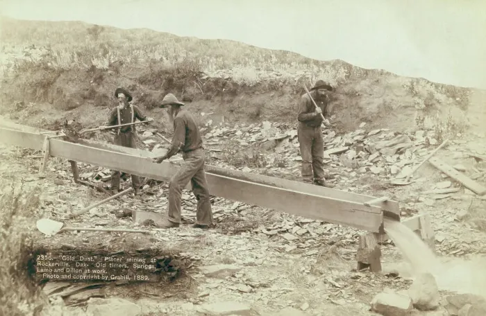 Framed Print : Gold Dust Placer mining at Rockerville, Dak Old timers, Spriggs, Lamb and Dillon at work, 1889. Creator: John C. H. Grabill Framed Print : Gold Dust Placer mining at Rockerville, Dak Old timers, Spriggs, Lamb and Dillon at work, 1889. Creator: John C. H. Grabill