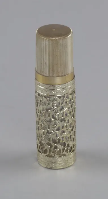Framed Print : Gold and glass perfume bottle from Maes Millinery Shop, 1941-1994. Creator: Anne Paree Framed Print : Gold and glass perfume bottle from Maes Millinery Shop, 1941-1994. Creator: Anne Paree