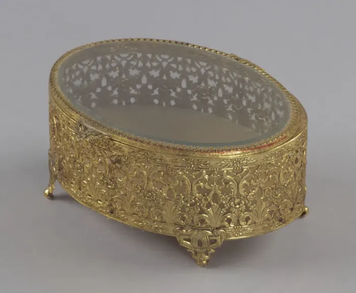 Framed Print : Gold metal scrollwork jewelry box from Maes Millinery Shop, 1941-1994. Creator: Unknown Framed Print : Gold metal scrollwork jewelry box from Maes Millinery Shop, 1941-1994. Creator: Unknown
