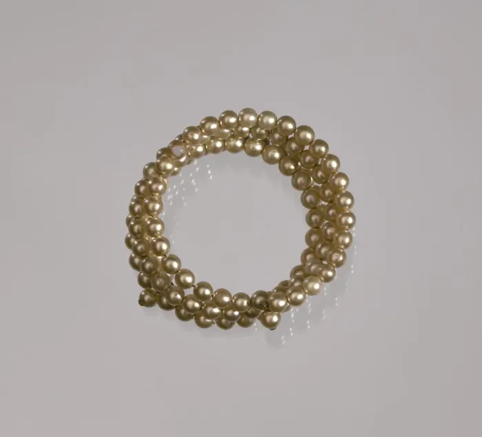 Framed Print : Gold pearl coil bracelet from Maes Millinery Shop, 1941-1994. Creator: Unknown Framed Print : Gold pearl coil bracelet from Maes Millinery Shop, 1941-1994. Creator: Unknown