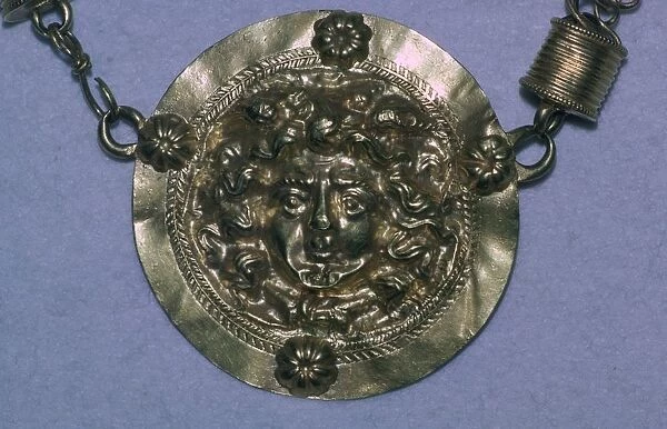 Gold Roman Gorgons head pendant
