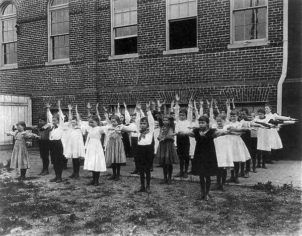 Grade school, Washington, D.C. - outdoor exercise class, (1899?). Creator: Frances Benjamin Johnston