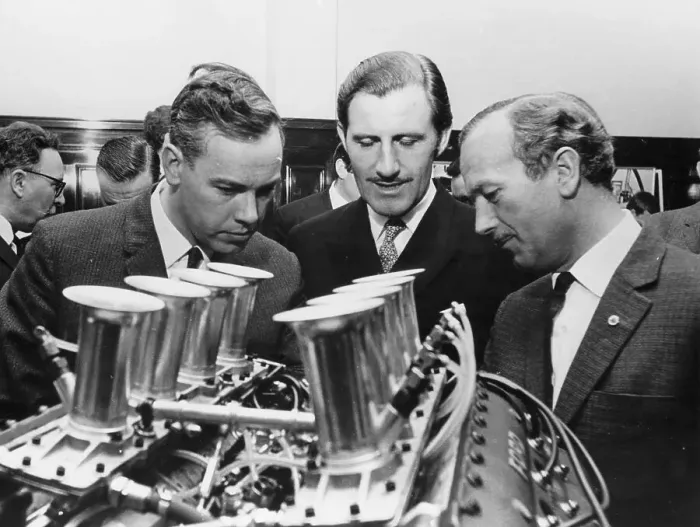 Framed Print : Graham Hill with Colin Chapman, c1967-c1970