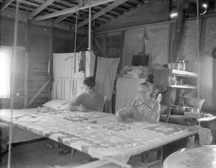 Framed Print : Grandmother from Oklahoma with grandson, working on quilt, California, Kern County, 1936. Creator: Dorothea Lange Framed Print : Grandmother from Oklahoma with grandson, working on quilt, California, Kern County, 1936. Creator: Dorothea Lange