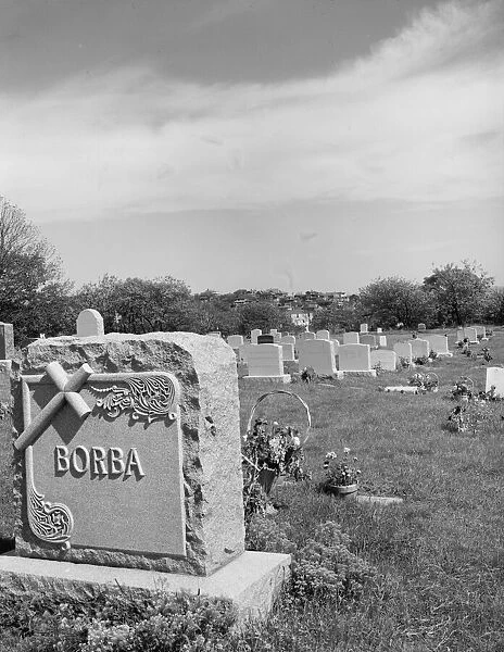 A graveyard at Gloucester which holds the remains of many of the... Gloucester, Massachusetts, 1943 Creator: Gordon Parks