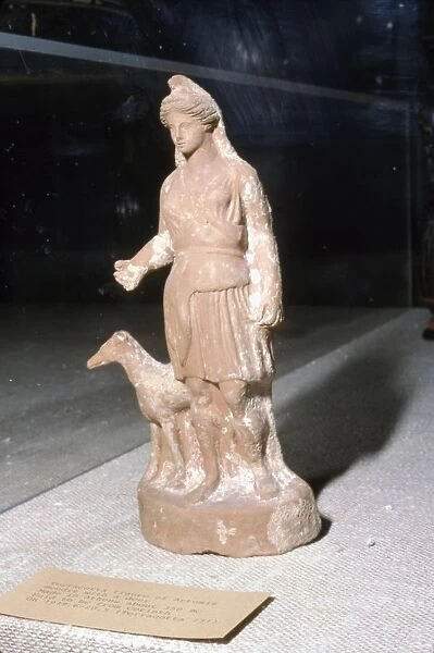 Greek Terracotta, Artemis Bendis with a small hunting dog, c350BC-c300 BC