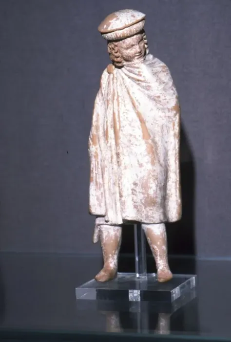 Framed Print : Greek Terracotta Boy wearing Cloak, Athens, 300 BC Framed Print : Greek Terracotta Boy wearing Cloak, Athens, 300 BC