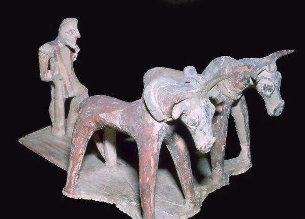 Greek terracotta of a man ploughing, 6th century BC