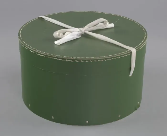 Framed Print : Green circular hatbox with lid from Maes Millinery Shop, 1941-1994. Creator: Unknown Framed Print : Green circular hatbox with lid from Maes Millinery Shop, 1941-1994. Creator: Unknown