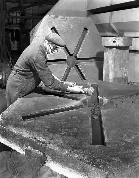 Grinding the flashing from a casting, AT Green & Sons Ltd, Rotherham, South Yorkshire, 1963