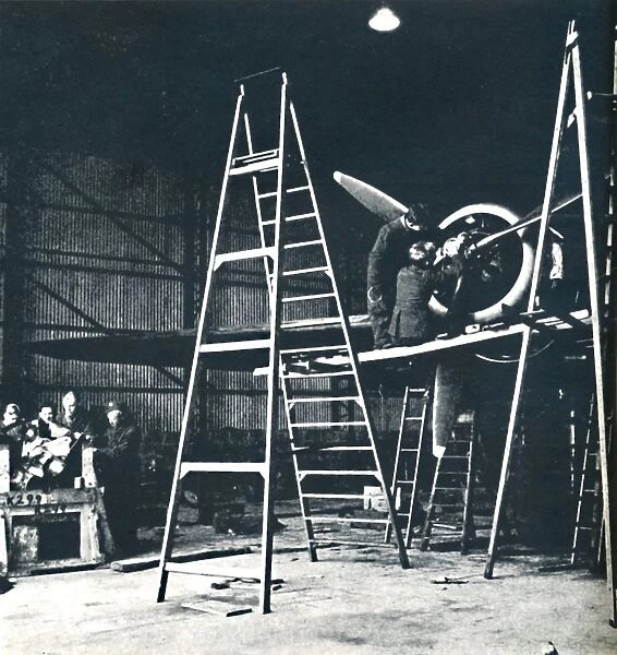 The ground crews work is never done, 1941. Artist: Cecil Beaton