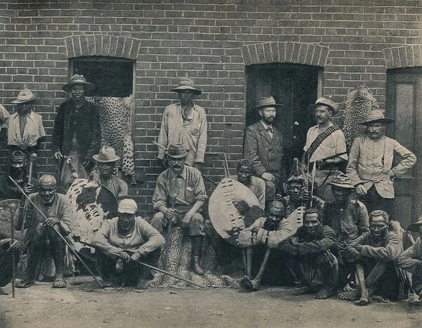 A Group of Afrikaners and Zulus, c1900. Creator: Unknown