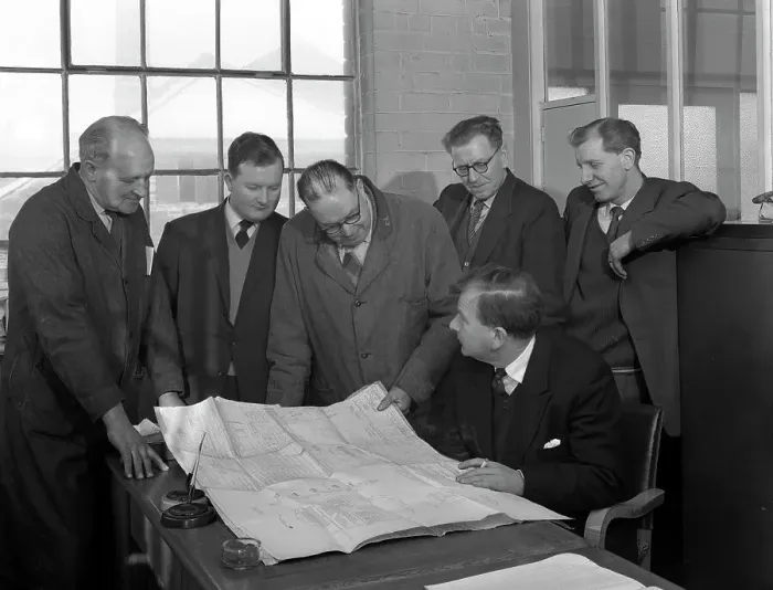Framed Print : A group of foundry staff with technical drawings, Sheffield, South Yorkshire, 1963 Framed Print : A group of foundry staff with technical drawings, Sheffield, South Yorkshire, 1963