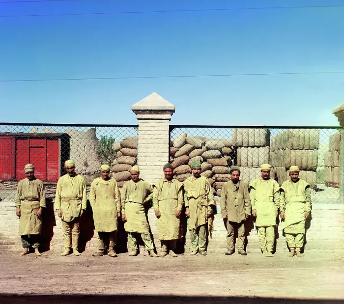 Framed Print : Group of labourers in front of a chain-link fence, between 1905-1915. Creator: Sergey Mikhaylovich Prokudin-Gorsky