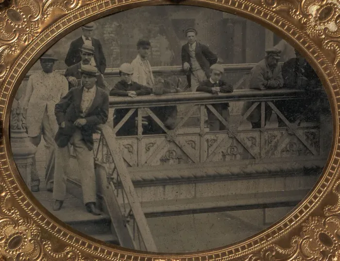 Framed Print : Group of Men and Boys Standing Along the Railing of the Fulton Street Bridge, 1866-68 Framed Print : Group of Men and Boys Standing Along the Railing of the Fulton Street Bridge, 1866-68