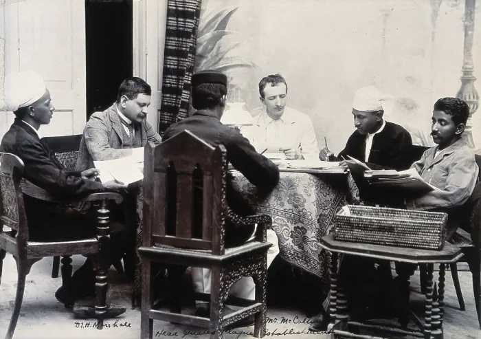 Framed Print : A group of men taking notes at a table, during a plague epidemic in Mandalay, 1906. Creator: Unknown