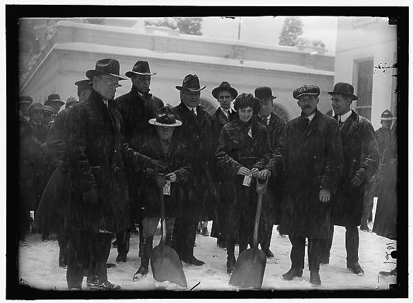 Group outside White House in snow, between 1913 and 1918. Creator: Harris & Ewing. Group outside White House in snow, between 1913 and 1918. Creator: Harris & Ewing
