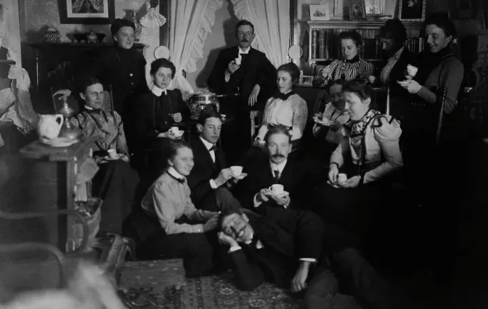 Framed Print : Group portrait of friends at social gathering, seated and standing with tea cups... c1890 - 1910. Creator: Frances Benjamin Johnston Framed Print : Group portrait of friends at social gathering, seated and standing with tea cups... c1890 - 1910. Creator: Frances Benjamin Johnston