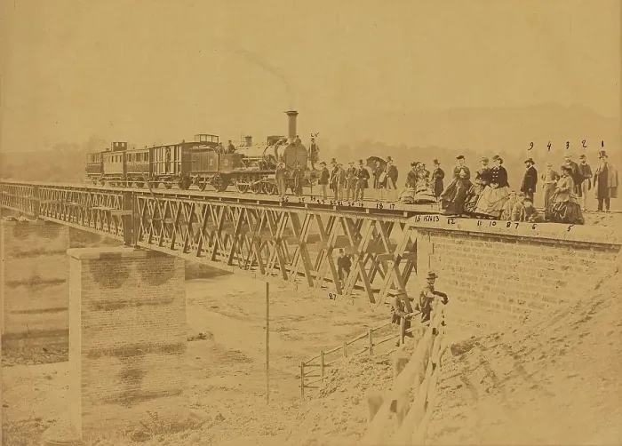 Framed Print : Group portrait with train on bridge, 1865. Creator: Altobelli & Molins Framed Print : Group portrait with train on bridge, 1865. Creator: Altobelli & Molins