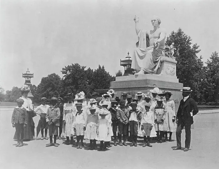 Framed Print : Group of school children in front of statue of George Washington, Washington, D.C. (1899?). Creator: Frances Benjamin Johnston Framed Print : Group of school children in front of statue of George Washington, Washington, D.C. (1899?). Creator: Frances Benjamin Johnston