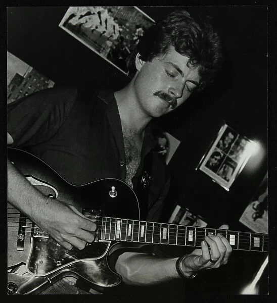 Guitarist Martin Taylor playing at the Middlesex and Herts Country Club, Harrow Weald, London, 1981