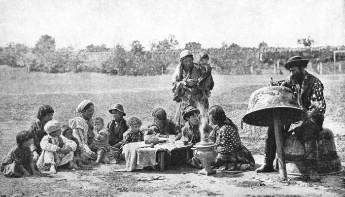 Framed Print : Gypsies mending a family cauldron, Hungary, 1922. Artist: AW Cutler
