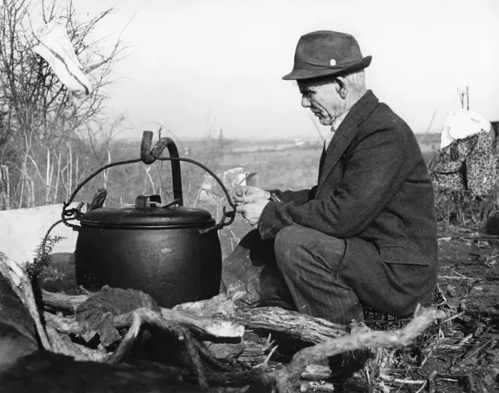 Framed Print : Gypsy man with cauldron, 1960s Framed Print : Gypsy man with cauldron, 1960s