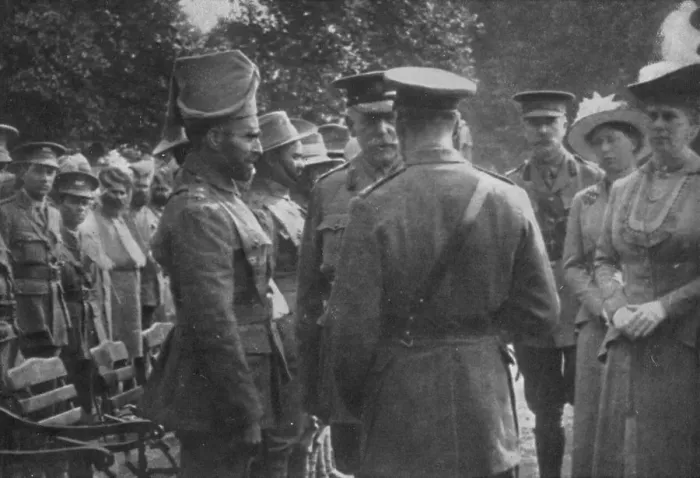 Framed Print : H. M. King George V Talking To Sir Walter Lawrence and Mir Dast, V. C. 25th August 1915, (1939) Framed Print : H. M. King George V Talking To Sir Walter Lawrence and Mir Dast, V. C. 25th August 1915, (1939)