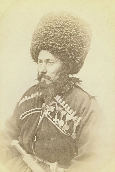 Half-length portrait of Daghestani man, facing left, between 1870 and 1886. Creator: Unknown