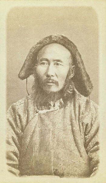 Half-length portrait of man, seated, facing slightly left, between 1870 and 1886. Creator: Unknown