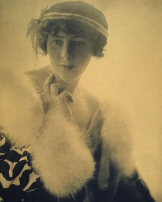 Framed Print : Half-length portrait of a woman wearing a fur trimmed coat, facing front, between 1900 and 1920. Creator: Unknown