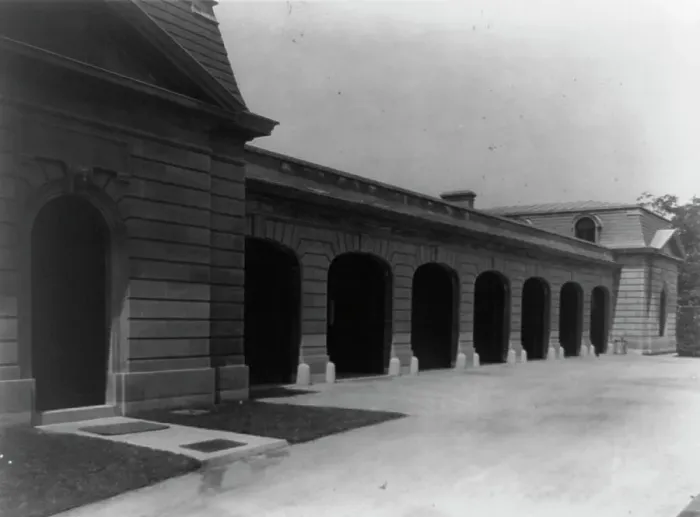 Framed Print : Hamilton Rice Home in Newport, Rhode Island, exterior view of garage doors, between 1917 and 1927. Creator: Frances Benjamin Johnston Framed Print : Hamilton Rice Home in Newport, Rhode Island, exterior view of garage doors, between 1917 and 1927. Creator: Frances Benjamin Johnston