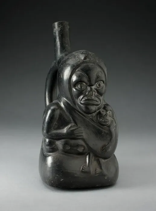 Framed Print : Handle Spout Vessel in the Form of a Skeletal Figure Holding a Child, 100 B. C. / A. D. 500 Framed Print : Handle Spout Vessel in the Form of a Skeletal Figure Holding a Child, 100 B. C. / A. D. 500