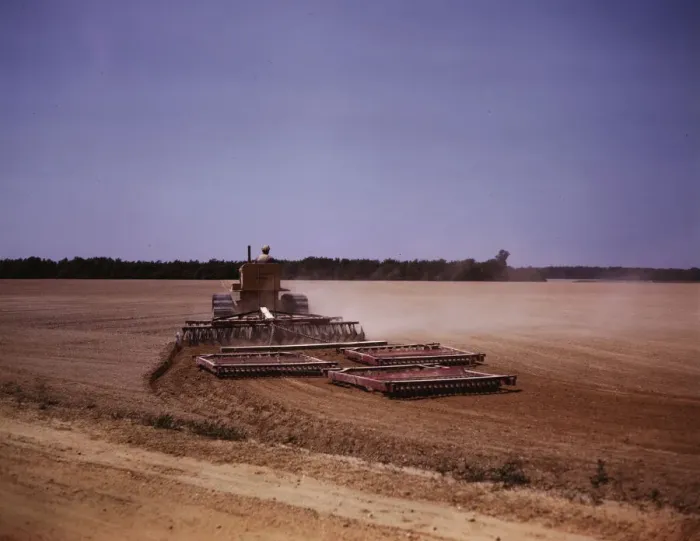 Framed Print : Harrowing a field with a diesel tractor, Seabrook Farm, Bridgeton, N. J. 1942. Creators: Marion Post Wolcott, John Collier Framed Print : Harrowing a field with a diesel tractor, Seabrook Farm, Bridgeton, N. J. 1942. Creators: Marion Post Wolcott, John Collier