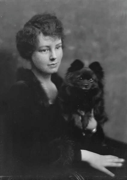 Hartshorne, Miss, with dog, portrait photograph, 1917 May 15. Creator: Arnold Genthe