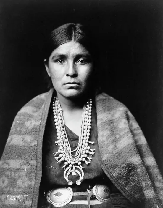 Framed Print : Head-and-shoulders portrait of Navajo woman, facing front, c1904. Creator: Edward Sheriff Curtis Framed Print : Head-and-shoulders portrait of Navajo woman, facing front, c1904. Creator: Edward Sheriff Curtis