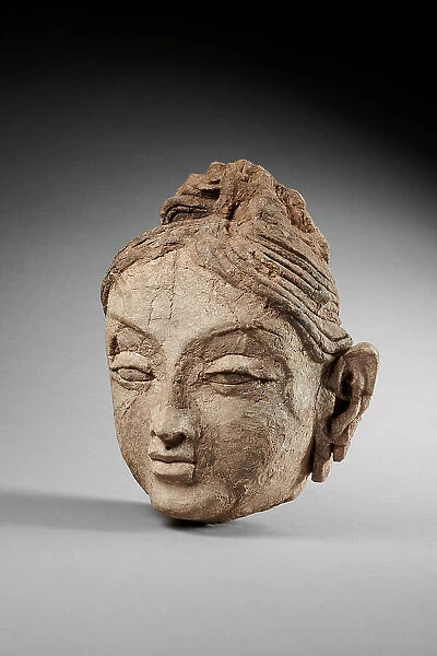 Head of a female. From Ajina Tepe, 7th-8th century. Creator: Central Asian Art