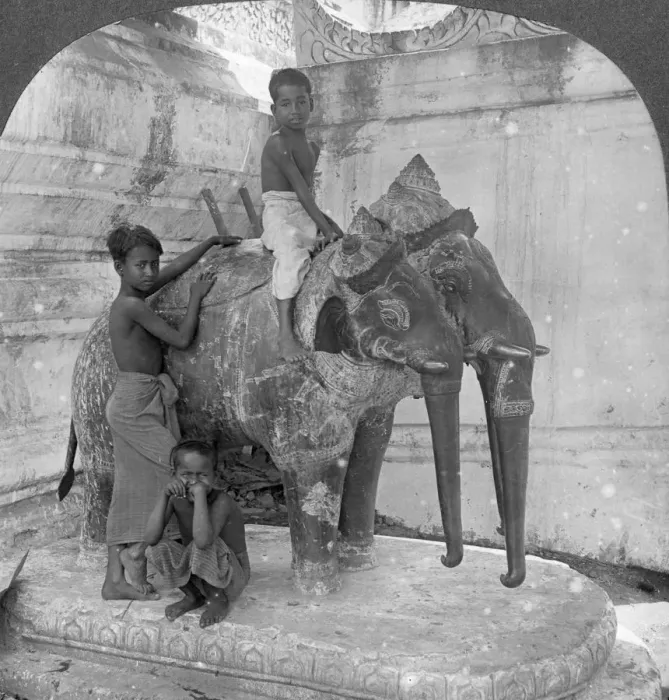 Framed Print : Three headed elephant guarding a sanctuary, Arakan Pagoda, Mandalay, Burma, 1908. Artist: Stereo Travel Co Framed Print : Three headed elephant guarding a sanctuary, Arakan Pagoda, Mandalay, Burma, 1908. Artist: Stereo Travel Co