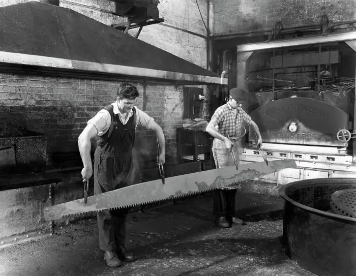 Framed Print : Heat treating a two metre saw blade, Slack Sellars & Co Ltd, Sheffield, South Yorkshire, 1963 Framed Print : Heat treating a two metre saw blade, Slack Sellars & Co Ltd, Sheffield, South Yorkshire, 1963