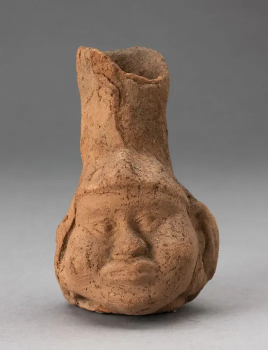 Framed Print : Heavily Eroded Miniature Jar in Form of a Human Head with Large Cheeks, 100 B. C. / A. D. 500 Framed Print : Heavily Eroded Miniature Jar in Form of a Human Head with Large Cheeks, 100 B. C. / A. D. 500