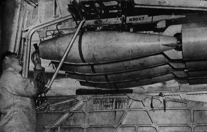 Framed Print : Heavy bombs in the racks of a RAF Short Sunderland flying boat, c1940 (1943) Framed Print : Heavy bombs in the racks of a RAF Short Sunderland flying boat, c1940 (1943)