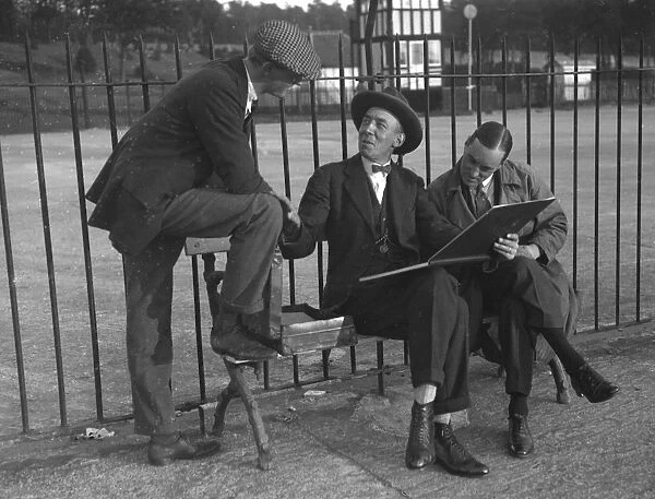 Henry Segrave, and Malcolm Campbell, with motoring artist Frederick Gordon Crosby, Brooklands
