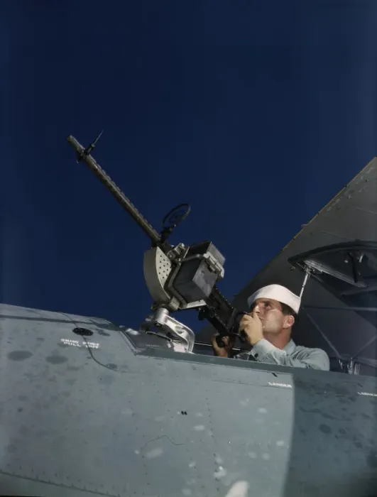 Framed Print : Hes like to use that gun on the Axis, Naval Air Base, Corpus Christi, Texas, 1942. Creator: Howard Hollem Framed Print : Hes like to use that gun on the Axis, Naval Air Base, Corpus Christi, Texas, 1942. Creator: Howard Hollem
