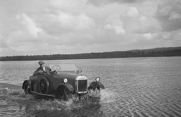 HG Pope driving a GWK through water at a demonstration event, Frensham Common Pond, Surrey, 1922