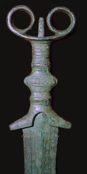Hilt of an early bronze sword, 7th century BC