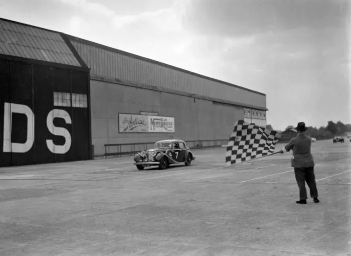 Framed Print : HJ Ripleys SS Jaguar taking the chequered flag, MCC Members Meeting, Brooklands Framed Print : HJ Ripleys SS Jaguar taking the chequered flag, MCC Members Meeting, Brooklands