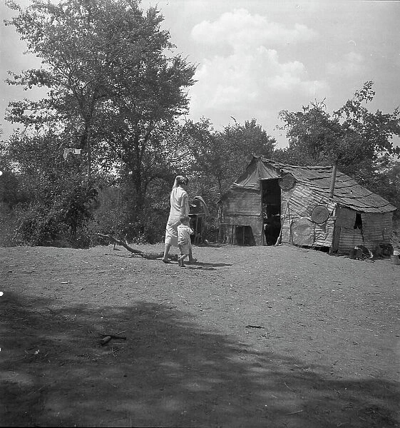 The home of a family in Oklahoma County, Elm Grove, Oklahoma, 1936. Creator: Dorothea Lange